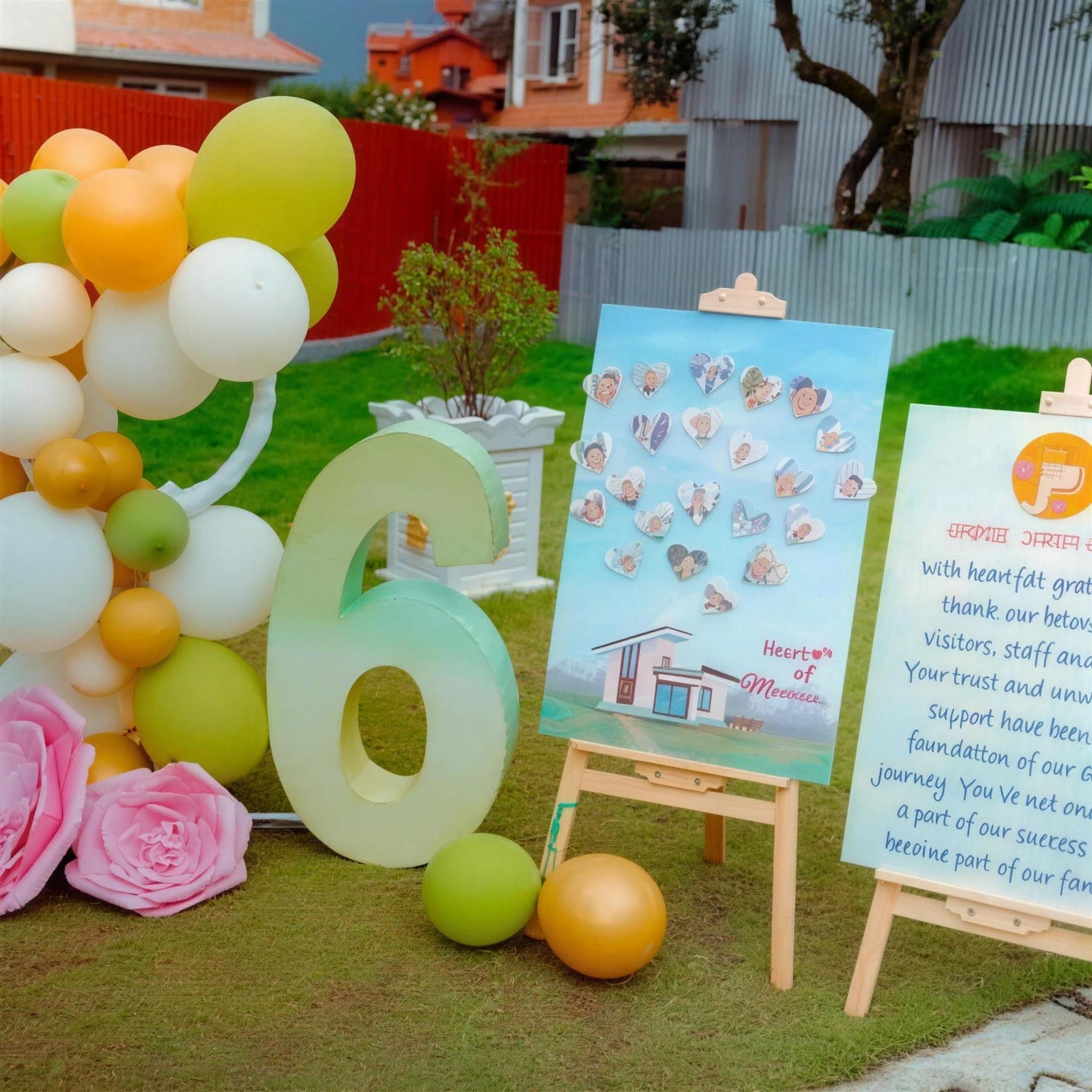 The 6-year anniversary display at Naman — balloon arch, welcome sign, and Heart of Memories board